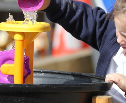 Radstock pupil playing with water toys