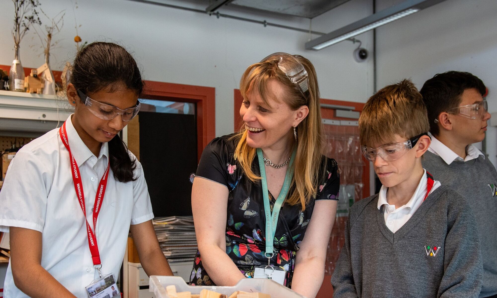 Waingels College pupils looking at work project